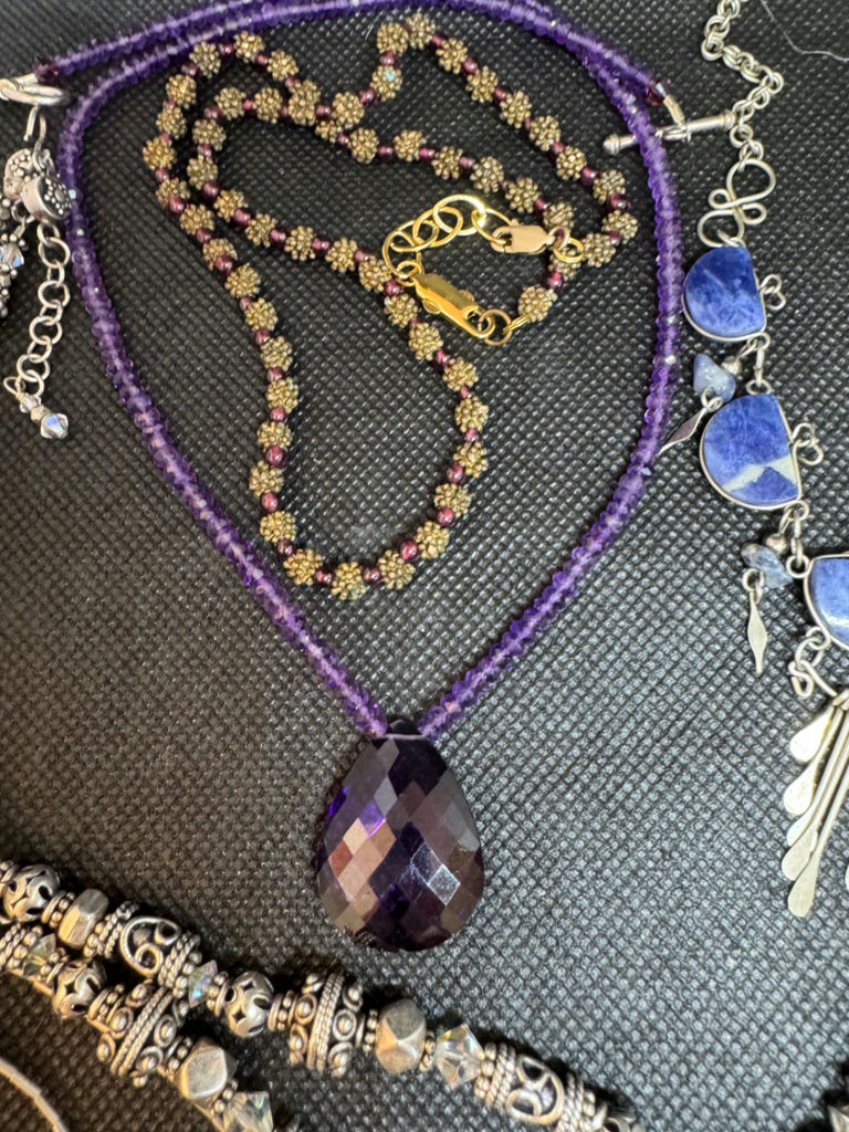 Assorted jewelry collection with pendants and beads - image 8 of 11