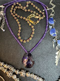 Assorted jewelry collection with pendants and beads - thumbnail 8 of 11