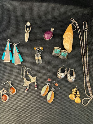 A Curated Collection of Sterling Silver Jewelry - Image 1 of 19