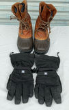 Brown Sorel winter boots and black insulated gloves - thumbnail 1 of 5