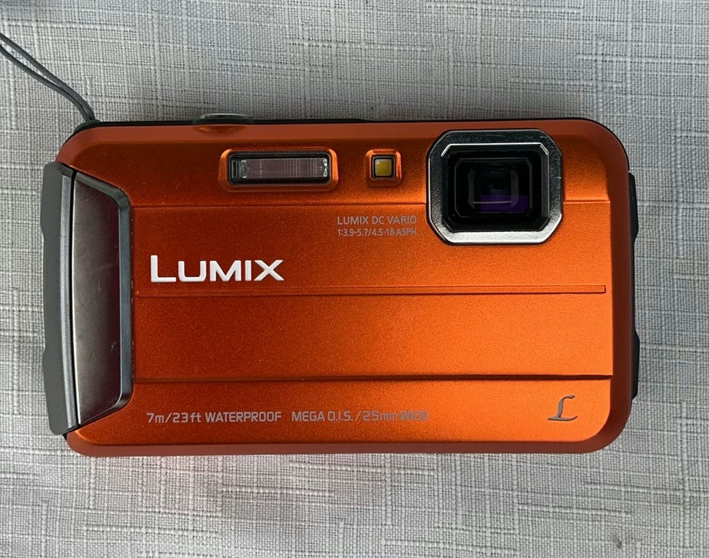 Assorted action cameras, camcorder, and accessories - image 3 of 5