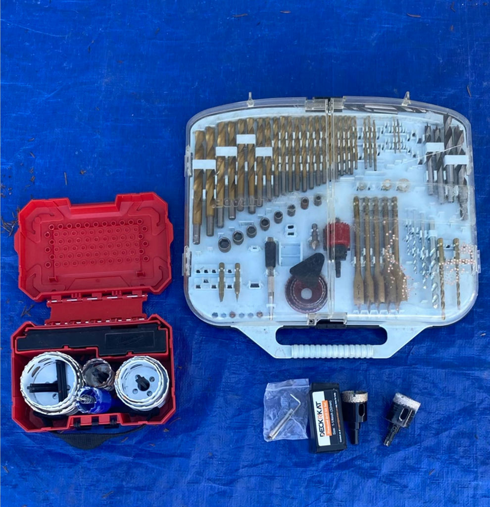 Drill bit and hole saw kit with multiple cases - image 1 of 7
