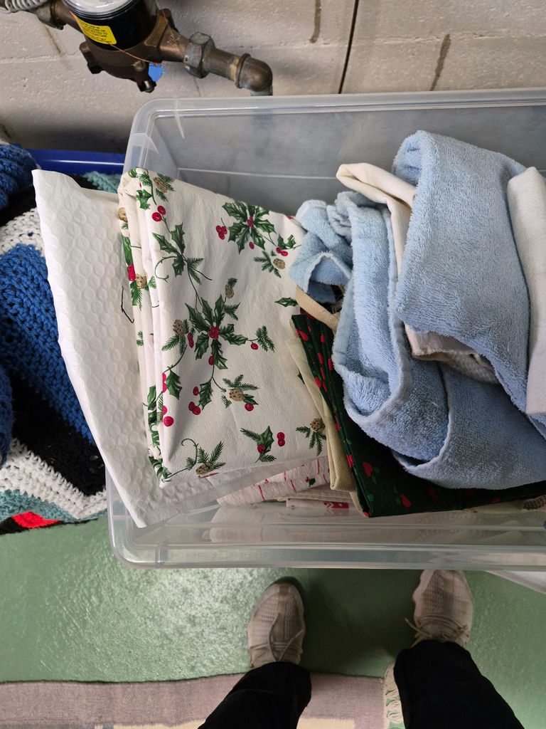 Plastic Storage Bin with Assorted Linens - image 3 of 3