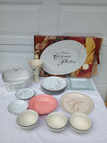 Assorted porcelain dinnerware with floral patterns and serving pieces - thumbnail 1 of 12