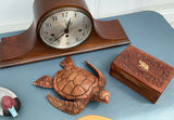 Antique mantel clock with carved turtle figurine, jewelry box, and curved decorative panel - thumbnail 2 of 6