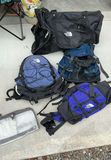 Assorted North Face outdoor backpacks and a duffel bag - thumbnail 1 of 5