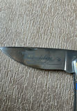 Assorted Knives, Machetes, and a Decorative Zombie-Killer Axe - thumbnail 7 of 9