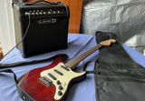 Red electric guitar with Line 6 Spider IV 15 amplifier - thumbnail 2 of 11