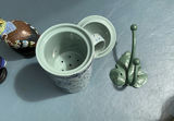 Vintage advertising signs, cloisonne bird figurines, and mug - thumbnail 6 of 6