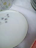Assorted porcelain dinnerware with floral patterns and serving pieces - thumbnail 11 of 12
