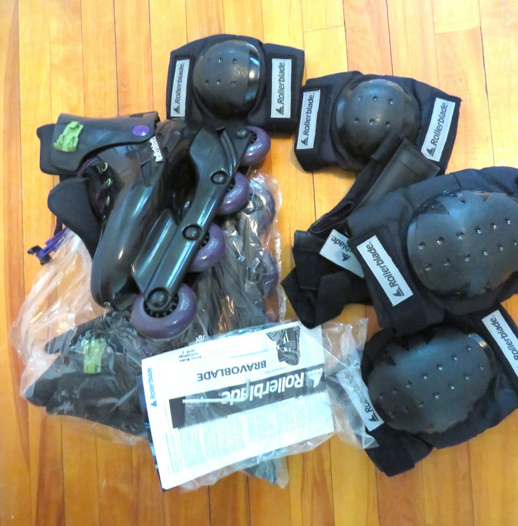 Pair of Roller Blade Boots with Blades and Pads - image 1 of 6