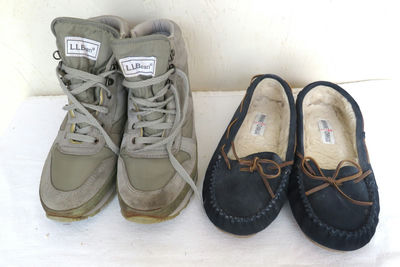 LL Bean Hiking Boots and Minnetonka Slippers - Image 1 of 8
