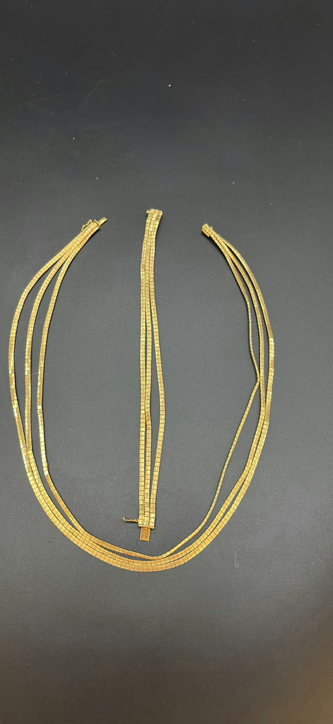 Gold Multi-Strand Necklace And Bracelet