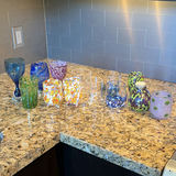 Assorted Hand-Blown Glass Cups and Decorative Glassware - thumbnail 1 of 10