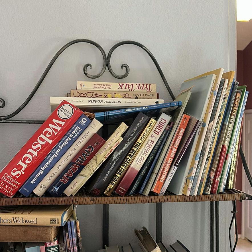 Metal and Wicker Shelving Unit with Books and Decorative Items - image 2 of 19