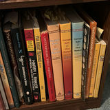 Wooden Bookshelf with Books, Binders, and Decorative Items - thumbnail 9 of 12