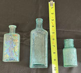 Collection of Five Aqua Glass Bottles - thumbnail 4 of 5
