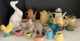 Assorted Ceramic and Glass Decorative Pitchers, Teapots, and Figurines - thumbnail 1 of 9