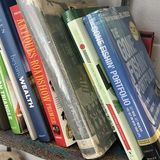 Metal and Wicker Shelving Unit with Books and Decorative Items - thumbnail 15 of 19