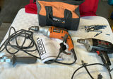 Corded drills and accessories in tool bag - thumbnail 1 of 8
