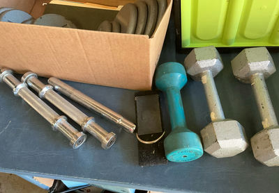 Assorted weight plates and dumbbell/barbell equipment - Image 1 of 3