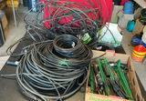 Assorted garden irrigation hoses, fittings, and timer - thumbnail 1 of 12