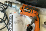 Corded drills and accessories in tool bag - thumbnail 2 of 8