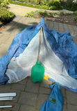 Camping Tent Setup with Poles and Gear - thumbnail 4 of 9