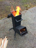 Metal freestanding Rocket stove with top grate and ash drawer - thumbnail 5 of 5