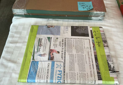 Stack of Glass Panels with Protective Edging - Image 1 of 3