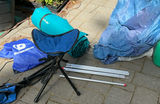 Camping Tent Setup with Poles and Gear - thumbnail 2 of 9