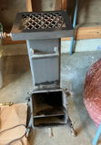 Metal freestanding Rocket stove with top grate and ash drawer - thumbnail 1 of 5