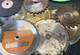 Assorted circular saw blades, grinding discs, and air hoses - thumbnail 5 of 6