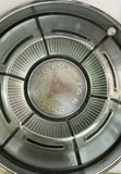 Vintage chrome car hubcaps and grille pieces - thumbnail 2 of 8