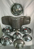 Vintage chrome car hubcaps and grille pieces - thumbnail 1 of 8