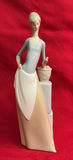Nao Lladro Porcelain 'Lady with Butterfly and Basket of Apples - thumbnail 1 of 5