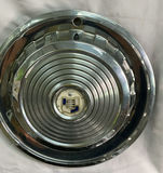 Vintage chrome car hubcaps and grille pieces - thumbnail 8 of 8