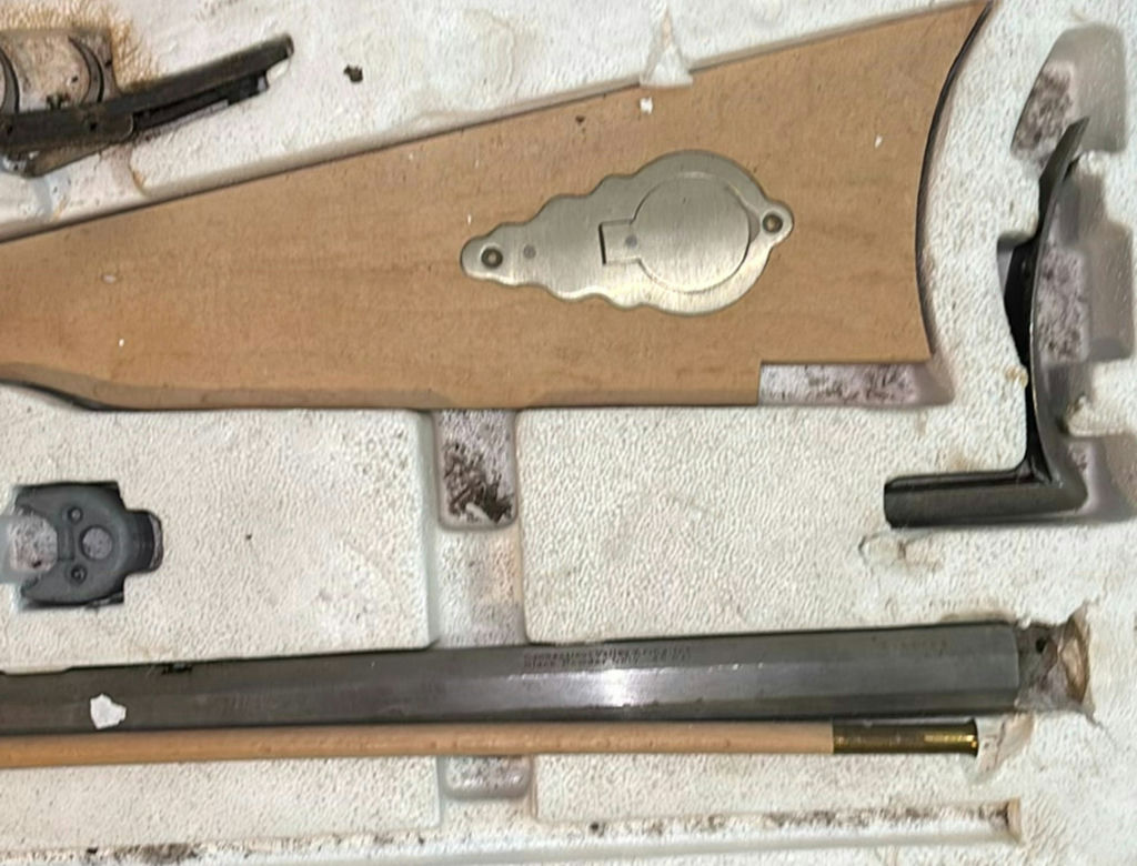 Disassembled firearm parts with wooden stocks and metal components - image 4 of 5