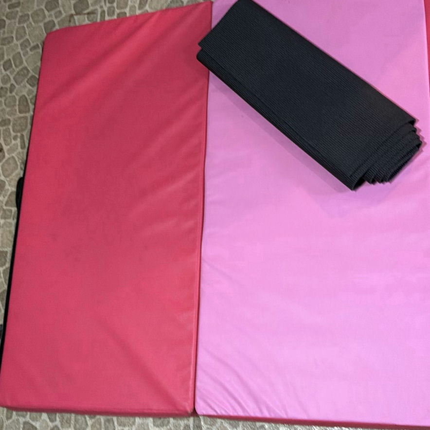 Pink and red folding gym mat with carrying strap - image 3 of 7
