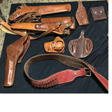 Assorted brown leather belts, holsters, and pouches - thumbnail 2 of 7