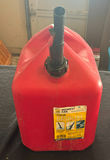 Two red gasoline cans - thumbnail 2 of 5