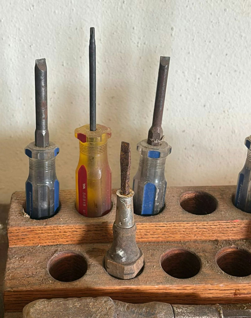 Assorted hand tools and screwdrivers in wooden rack - image 6 of 8