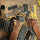 Assorted firearm magazines, holsters, and ammo box - thumbnail 6 of 7