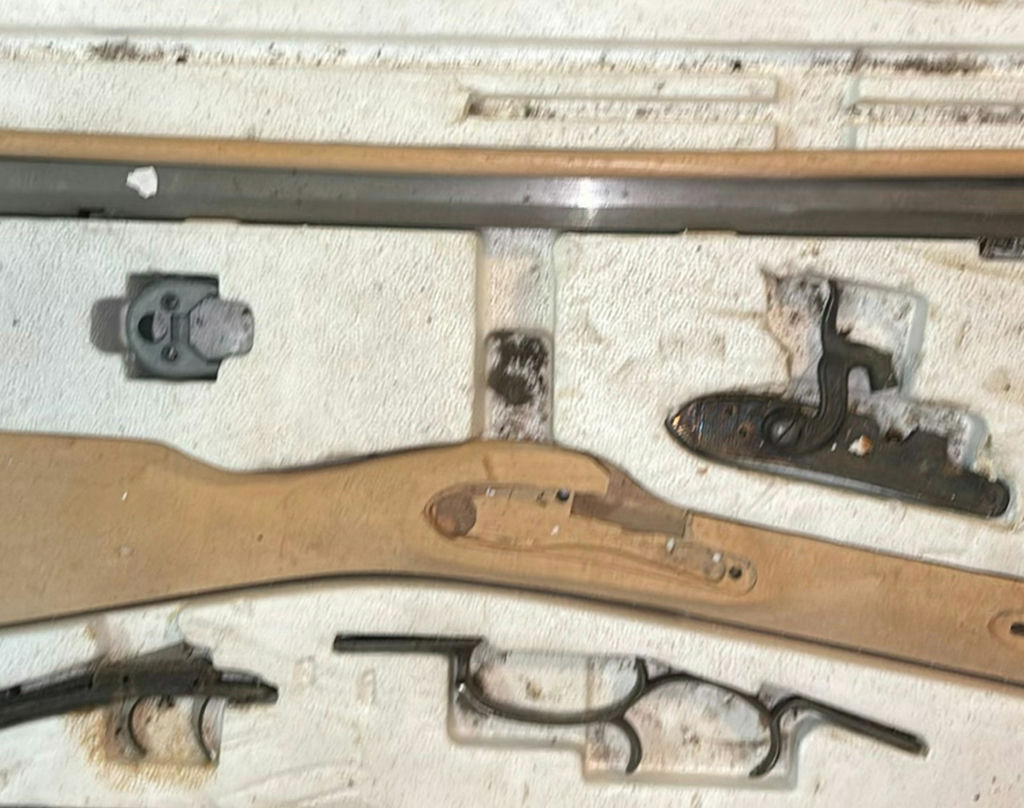 Disassembled firearm parts with wooden stocks and metal components - image 5 of 5