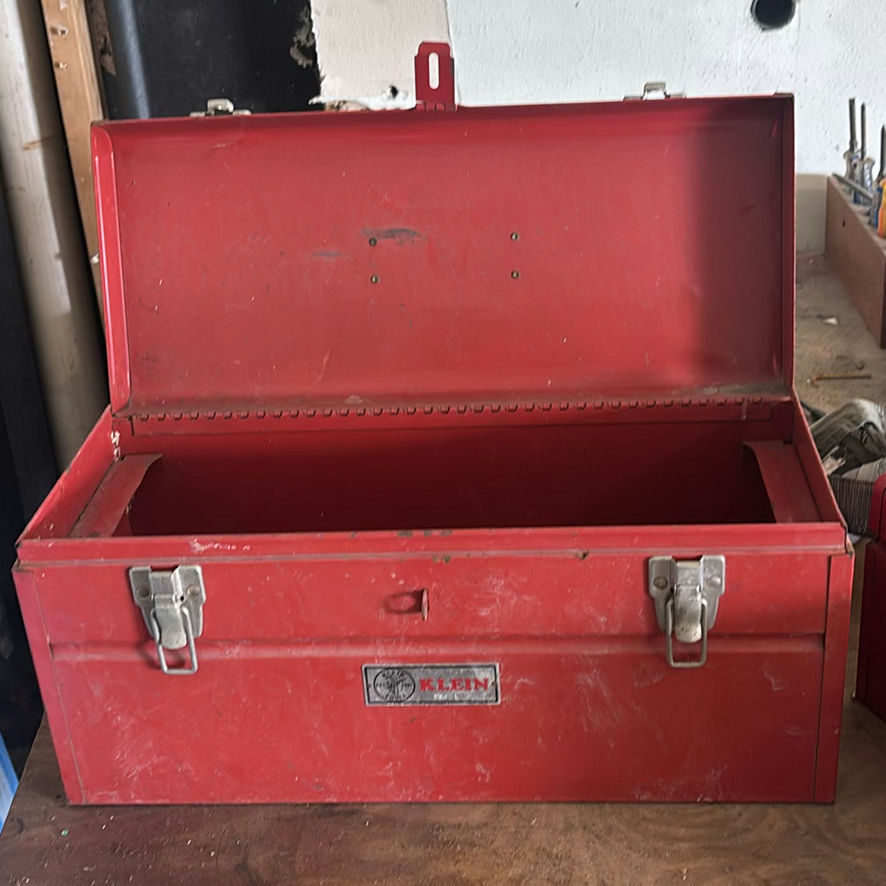 Red metal tool chest with lid and latches - image 1 of 6