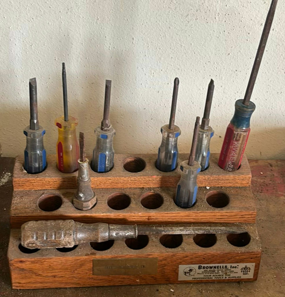 Assorted hand tools and screwdrivers in wooden rack - image 5 of 8