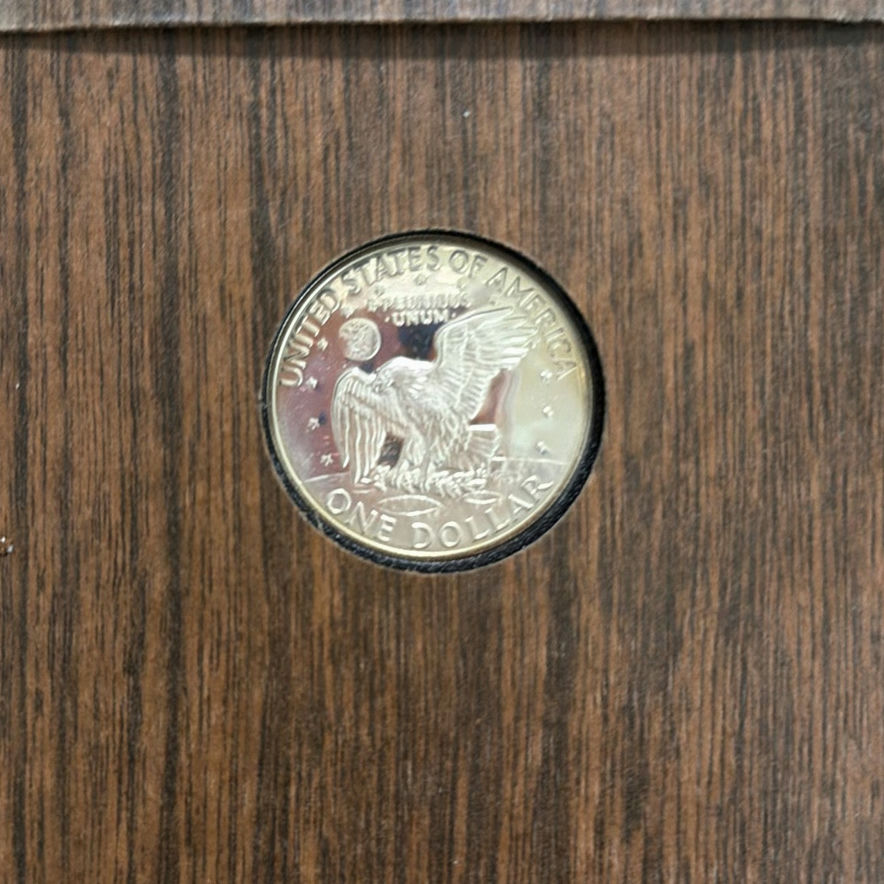 2 Eisenhower dollar coins in display boxes - image 5 of 6
