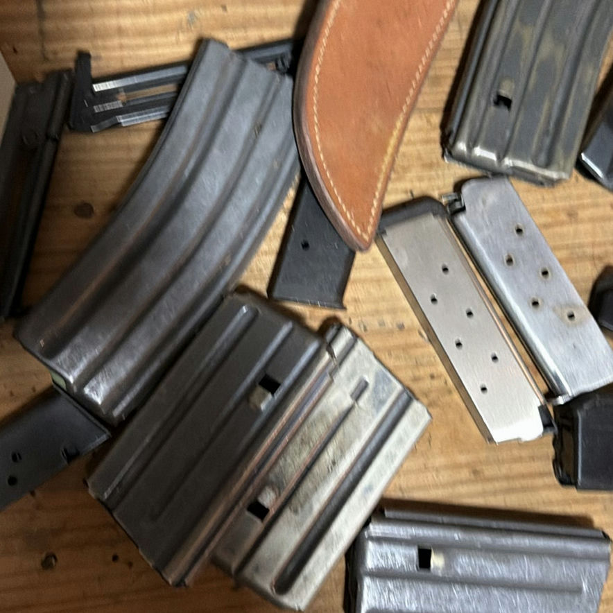 Assorted firearm magazines, holsters, and ammo box - image 7 of 7