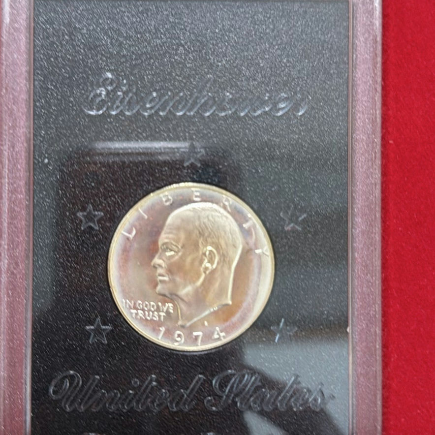 2 Eisenhower dollar coins in display boxes - image 3 of 6