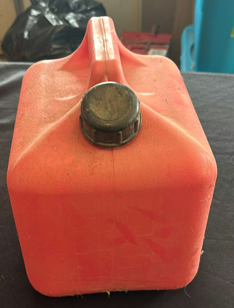 Two red gasoline cans - image 4 of 5